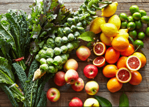 a group of fruits and vegetables on a wood surface Healthy Weight Loss Diets Witney